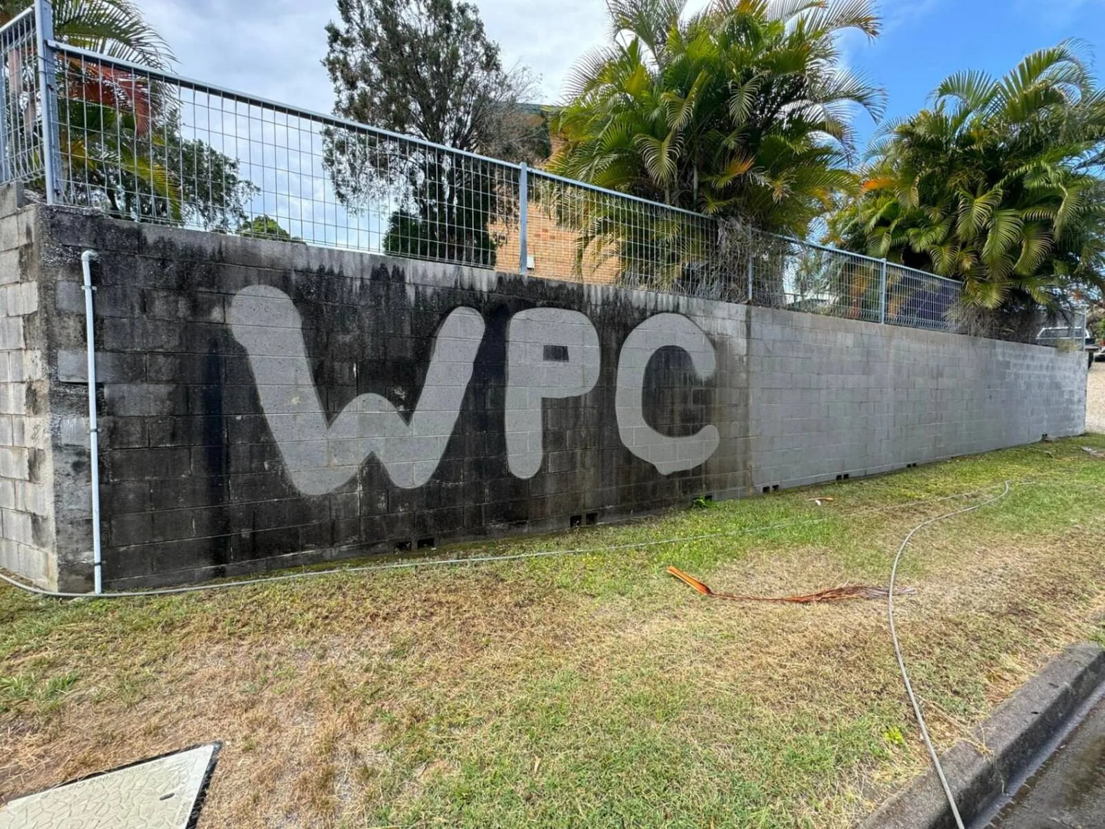 Wrightway Pressure Cleaning team at work in Rockhampton
